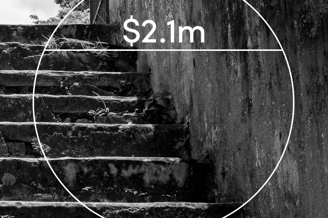 Black and white stone staircase with text overlaid: $2.1m