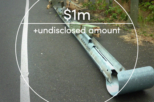 Broken road guardrail with text overlaid: $1m + undisclosed amount