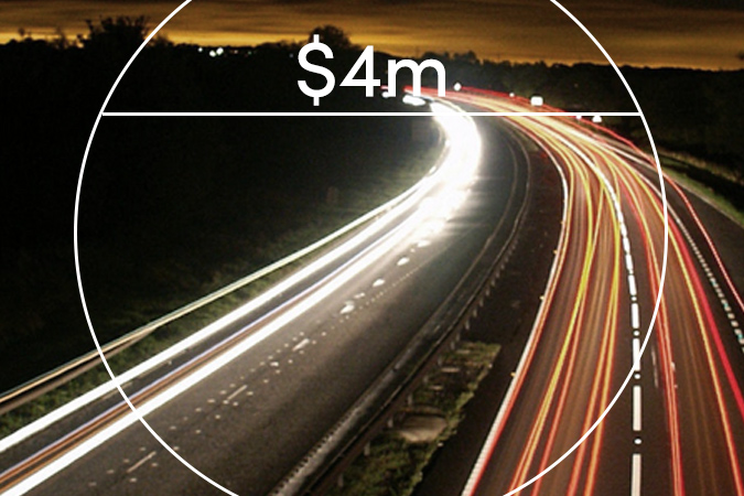 Time-lapse photo of cars on highway at night. Text overlaid: $4m