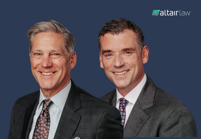 Two smiling men in suits against a dark blue background, with the Altair Law logo in the top right corner.
